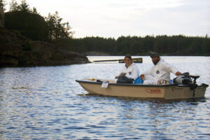 Two people in boat. 