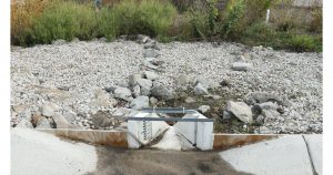 Water flowing into gravel area. 