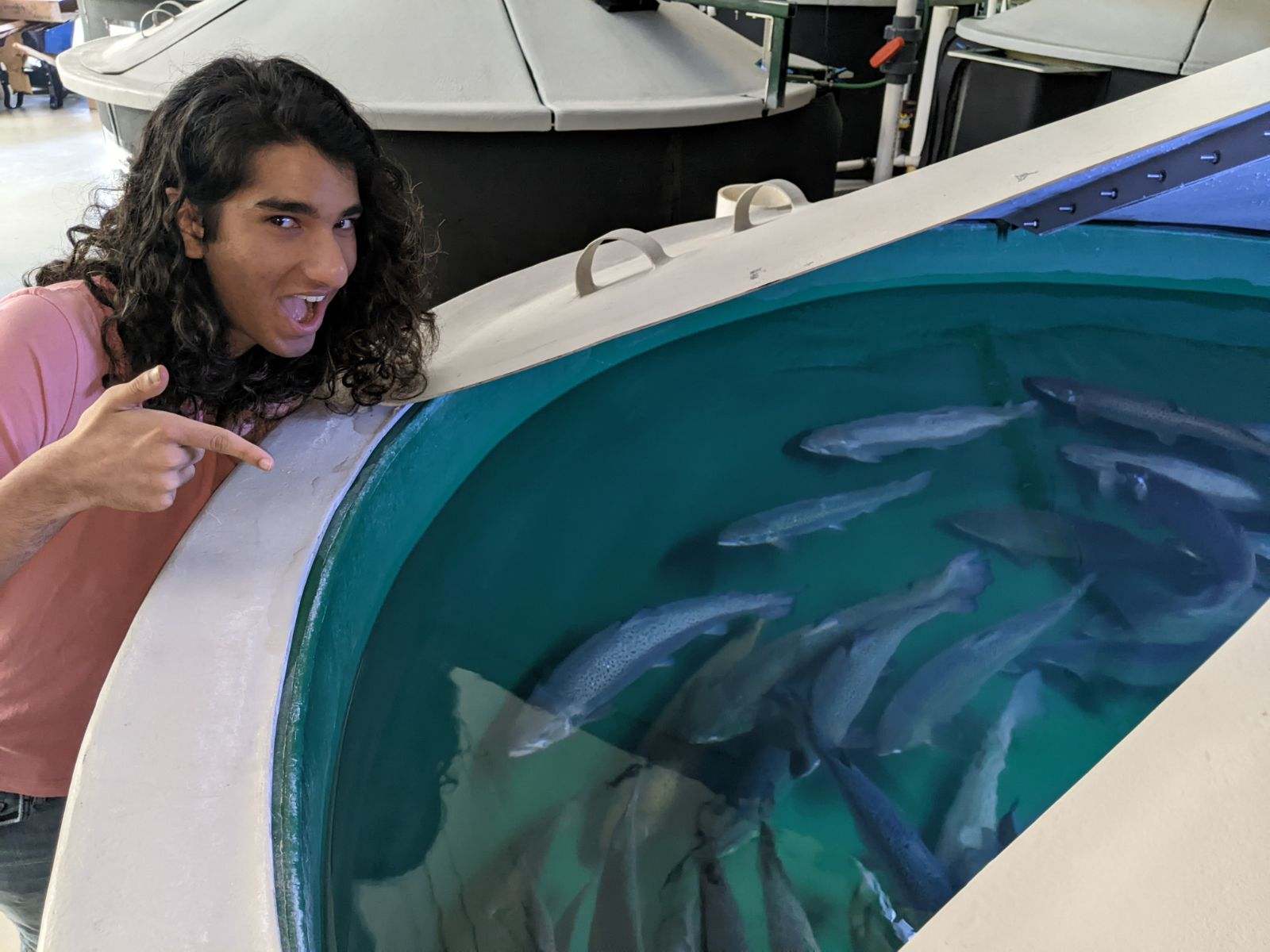 Crow Idnani at the UW-Stevens Point Northern Aquaculture Demonstration Facility