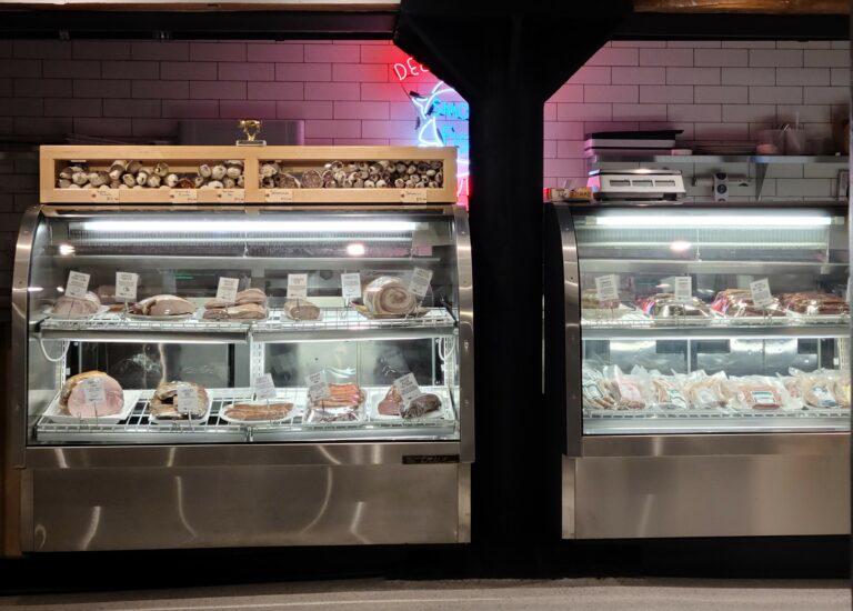 The deli counter at the Smokehaus’ new location in the DeWitt-Seitz Building basement at Canal Park in Duluth, Minnesota. Image credit: Marie Zhuikov, Wisconsin Sea Grant