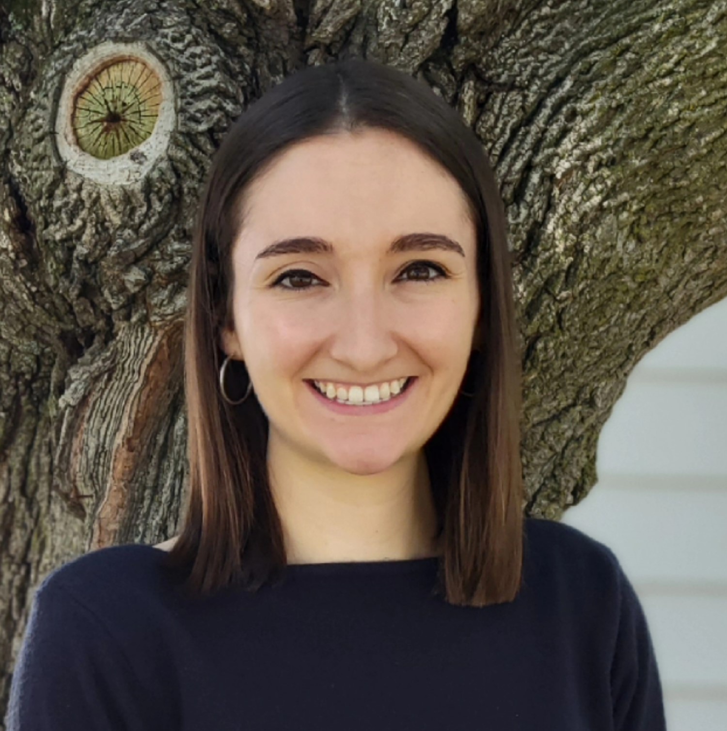 A headshot of Emily Rau.