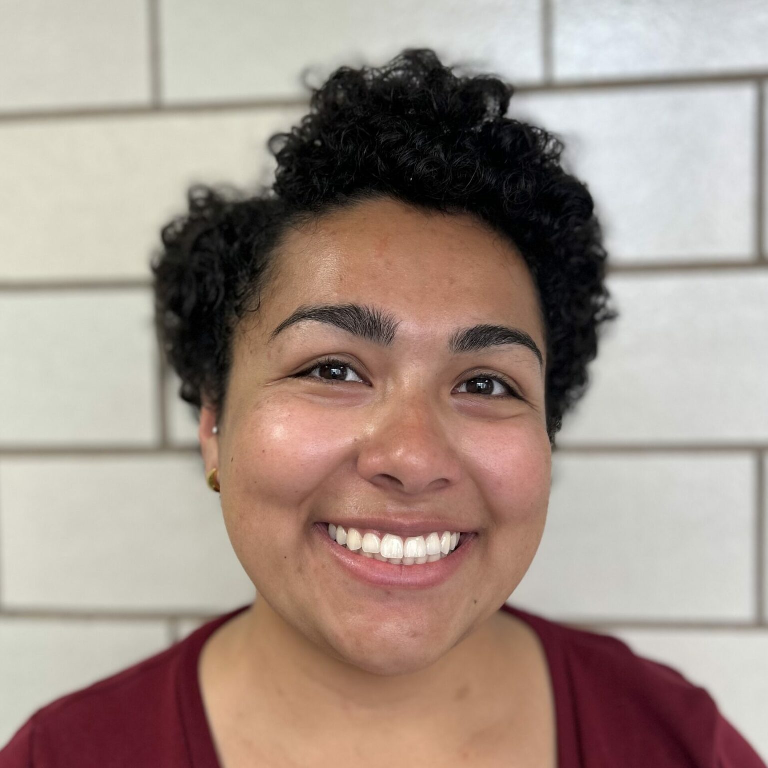 A headshot of Marian Azeem-Angel.